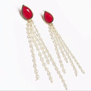 Red earrings with dangling pearls